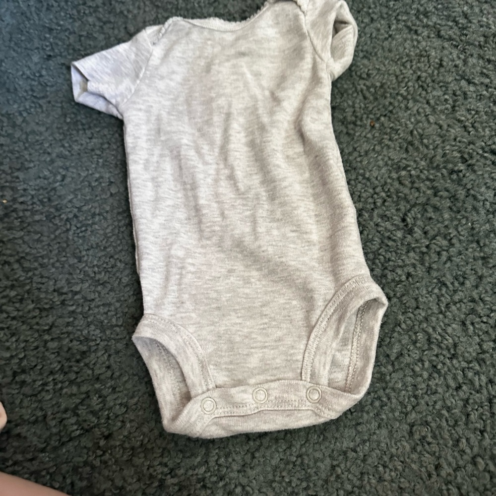 Gray Carter’s newborn short sleeve onesie